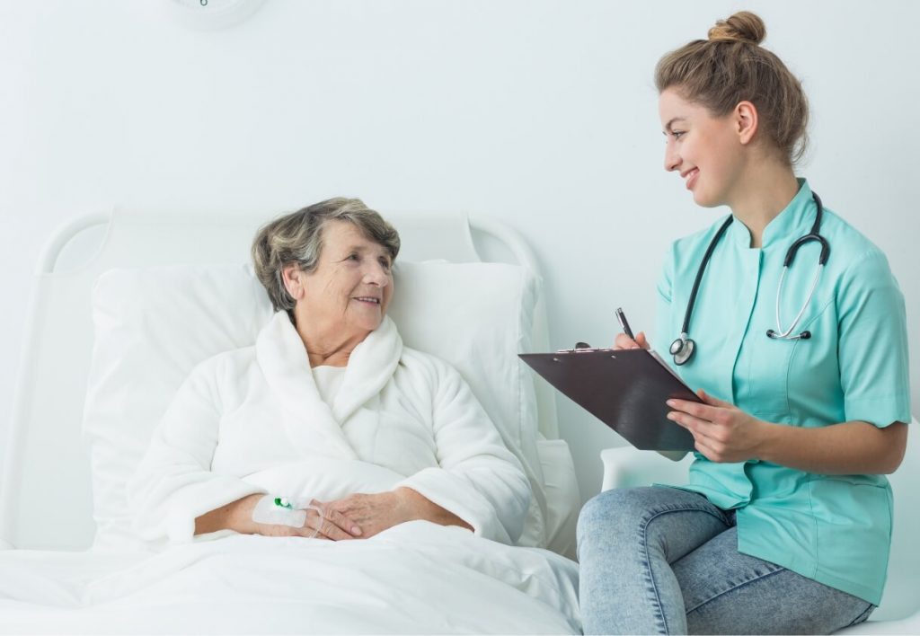 nurse talking with patient